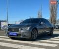 Серый Инфинити Q50, объемом двигателя 2.14 л и пробегом 160 тыс. км за 13700 $, фото 1 на Automoto.ua