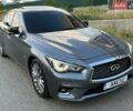 Серый Инфинити Q50, объемом двигателя 3 л и пробегом 100 тыс. км за 12500 $, фото 1 на Automoto.ua