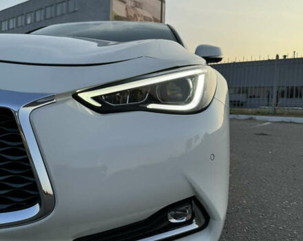 Белый Инфинити Q60, объемом двигателя 3 л и пробегом 104 тыс. км за 26800 $, фото 1 на Automoto.ua