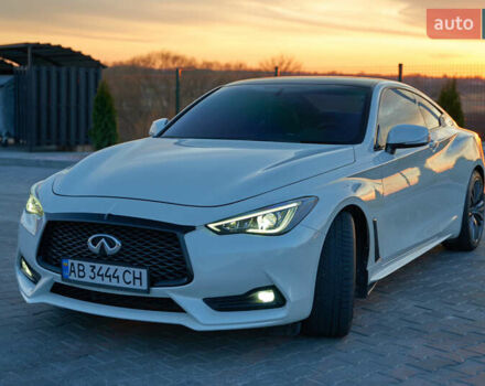Белый Инфинити Q60, объемом двигателя 3 л и пробегом 95 тыс. км за 22900 $, фото 1 на Automoto.ua