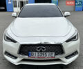 Белый Инфинити Q60, объемом двигателя 3 л и пробегом 117 тыс. км за 22999 $, фото 1 на Automoto.ua