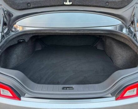 Серый Инфинити Q60, объемом двигателя 3.7 л и пробегом 90 тыс. км за 13299 $, фото 2 на Automoto.ua