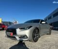 Серый Инфинити Q60, объемом двигателя 3 л и пробегом 159 тыс. км за 22290 $, фото 1 на Automoto.ua