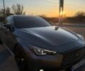 Серый Инфинити Q60, объемом двигателя 3 л и пробегом 95 тыс. км за 23500 $, фото 1 на Automoto.ua