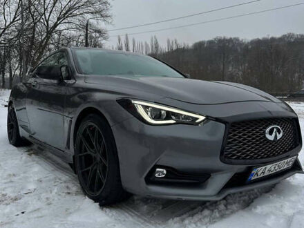 Серый Инфинити Q60, объемом двигателя 3 л и пробегом 128 тыс. км за 23500 $, фото 1 на Automoto.ua