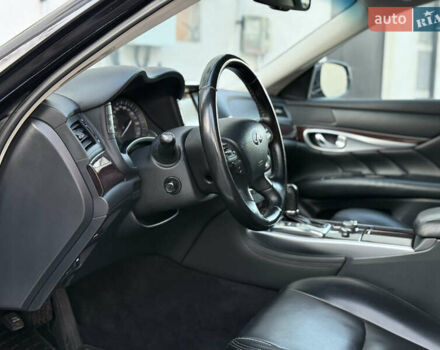 Фиолетовый Инфинити Q70, объемом двигателя 2.14 л и пробегом 209 тыс. км за 14400 $, фото 10 на Automoto.ua