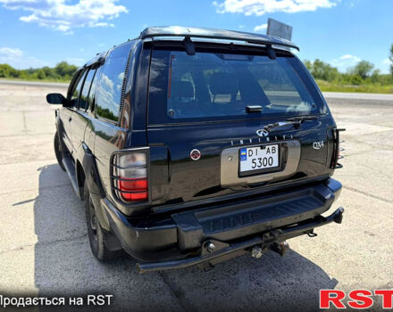 Черный Инфинити КХ, объемом двигателя 3.3 л и пробегом 300 тыс. км за 6999 $, фото 5 на Automoto.ua