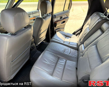 Черный Инфинити КХ, объемом двигателя 3.3 л и пробегом 300 тыс. км за 6999 $, фото 7 на Automoto.ua