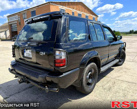 Черный Инфинити КХ, объемом двигателя 3.3 л и пробегом 300 тыс. км за 6999 $, фото 2 на Automoto.ua