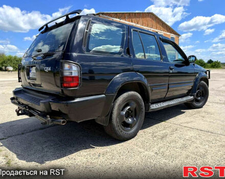 Черный Инфинити КХ, объемом двигателя 3.3 л и пробегом 300 тыс. км за 6999 $, фото 4 на Automoto.ua