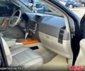 Черный Инфинити КХ, объемом двигателя 5.6 л и пробегом 235 тыс. км за 9500 $, фото 3 на Automoto.ua