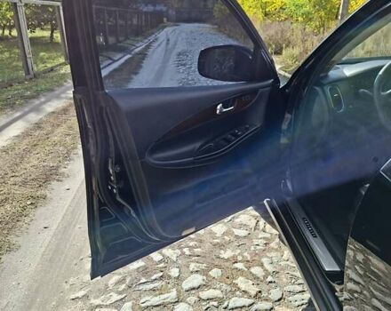 Черный Инфинити QX50, объемом двигателя 3.7 л и пробегом 111 тыс. км за 14000 $, фото 15 на Automoto.ua