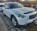 Белый Инфинити QX70, объемом двигателя 3 л и пробегом 140 тыс. км за 25500 $, фото 1 на Automoto.ua