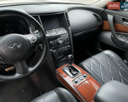 Белый Инфинити QX70, объемом двигателя 2.99 л и пробегом 128 тыс. км за 19800 $, фото 107 на Automoto.ua