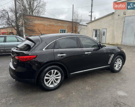 Черный Инфинити QX70, объемом двигателя 3.7 л и пробегом 185 тыс. км за 17700 $, фото 4 на Automoto.ua