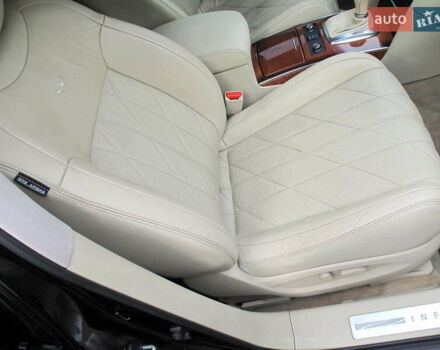 Черный Инфинити QX70, объемом двигателя 3.7 л и пробегом 235 тыс. км за 17300 $, фото 65 на Automoto.ua