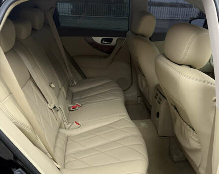 Черный Инфинити QX70, объемом двигателя 3.7 л и пробегом 131 тыс. км за 13599 $, фото 19 на Automoto.ua