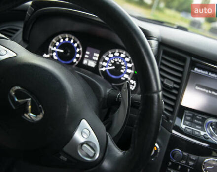 Черный Инфинити QX70, объемом двигателя 3.7 л и пробегом 124 тыс. км за 23000 $, фото 32 на Automoto.ua