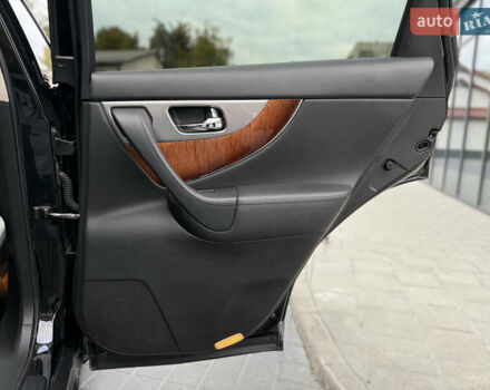 Черный Инфинити QX70, объемом двигателя 3.7 л и пробегом 141 тыс. км за 21500 $, фото 45 на Automoto.ua