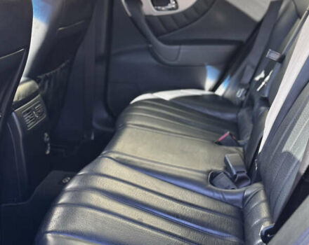 Синий Инфинити QX70, объемом двигателя 3.7 л и пробегом 125 тыс. км за 15200 $, фото 3 на Automoto.ua