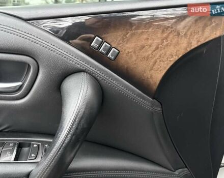 Белый Инфинити QX80, объемом двигателя 5.6 л и пробегом 202 тыс. км за 18800 $, фото 8 на Automoto.ua