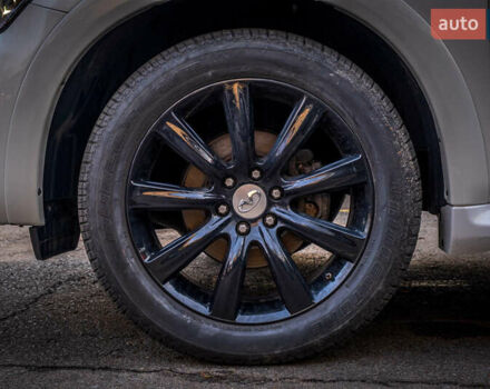 Белый Инфинити QX80, объемом двигателя 5.55 л и пробегом 81 тыс. км за 25000 $, фото 18 на Automoto.ua