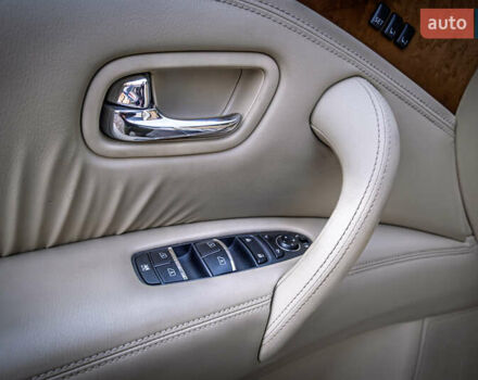 Белый Инфинити QX80, объемом двигателя 5.55 л и пробегом 81 тыс. км за 25000 $, фото 34 на Automoto.ua