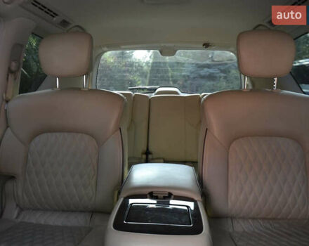 Белый Инфинити QX80, объемом двигателя 5.55 л и пробегом 100 тыс. км за 45500 $, фото 4 на Automoto.ua