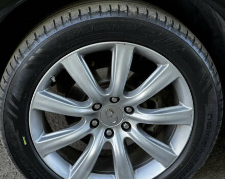 Черный Инфинити QX80, объемом двигателя 5.55 л и пробегом 298 тыс. км за 20700 $, фото 35 на Automoto.ua