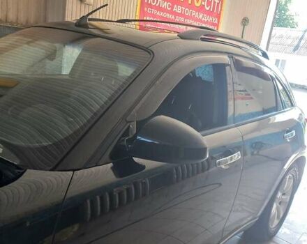 Черный Инфинити FX 35, объемом двигателя 3.5 л и пробегом 300 тыс. км за 9000 $, фото 6 на Automoto.ua