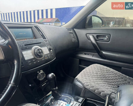 Черный Инфинити FX 35, объемом двигателя 3.5 л и пробегом 298 тыс. км за 10500 $, фото 18 на Automoto.ua