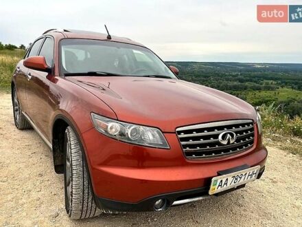 Красный Инфинити FX 35, объемом двигателя 3.5 л и пробегом 205 тыс. км за 9700 $, фото 1 на Automoto.ua