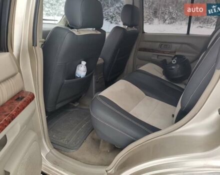 Бежевый Инфинити QX4, объемом двигателя 3.3 л и пробегом 350 тыс. км за 5500 $, фото 11 на Automoto.ua