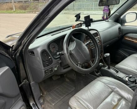 Чорний Інфініті QX4, об'ємом двигуна 3.3 л та пробігом 250 тис. км за 5600 $, фото 7 на Automoto.ua