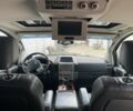 Белый Инфинити QX56, объемом двигателя 5.6 л и пробегом 300 тыс. км за 3200 $, фото 4 на Automoto.ua