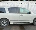 Белый Инфинити QX56, объемом двигателя 5.6 л и пробегом 300 тыс. км за 3200 $, фото 1 на Automoto.ua