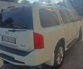 Белый Инфинити QX56, объемом двигателя 5.6 л и пробегом 182 тыс. км за 14600 $, фото 2 на Automoto.ua