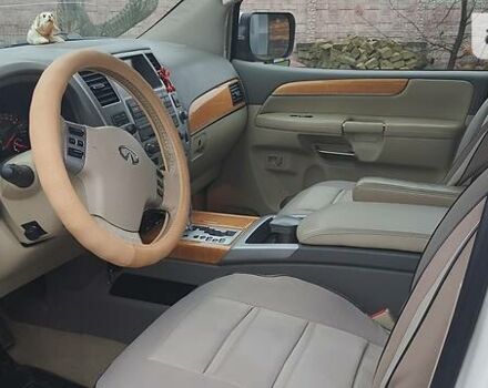 Белый Инфинити QX56, объемом двигателя 5.6 л и пробегом 232 тыс. км за 14000 $, фото 8 на Automoto.ua