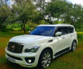 Белый Инфинити QX56, объемом двигателя 5.55 л и пробегом 148 тыс. км за 26950 $, фото 1 на Automoto.ua