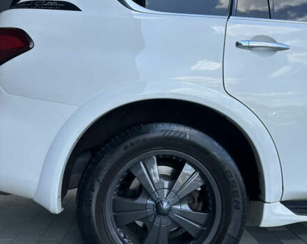 Белый Инфинити QX56, объемом двигателя 5.55 л и пробегом 208 тыс. км за 23000 $, фото 10 на Automoto.ua