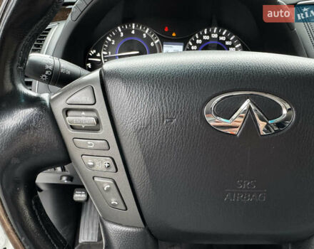 Белый Инфинити QX56, объемом двигателя 5.6 л и пробегом 138 тыс. км за 16800 $, фото 41 на Automoto.ua