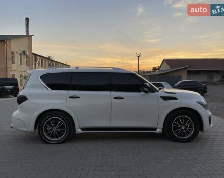 Белый Инфинити QX56, объемом двигателя 5.6 л и пробегом 230 тыс. км за 27900 $, фото 3 на Automoto.ua