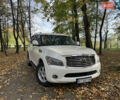 Белый Инфинити QX56, объемом двигателя 5.6 л и пробегом 300 тыс. км за 15500 $, фото 1 на Automoto.ua