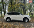 Белый Инфинити QX56, объемом двигателя 5.6 л и пробегом 300 тыс. км за 15500 $, фото 4 на Automoto.ua