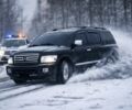 Чорний Інфініті QX56, об'ємом двигуна 5.6 л та пробігом 284 тис. км за 9000 $, фото 1 на Automoto.ua