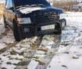 Черный Инфинити QX56, объемом двигателя 5.6 л и пробегом 280 тыс. км за 10000 $, фото 1 на Automoto.ua