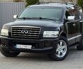 Черный Инфинити QX56, объемом двигателя 5.6 л и пробегом 310 тыс. км за 8100 $, фото 1 на Automoto.ua
