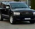 Черный Инфинити QX56, объемом двигателя 5.6 л и пробегом 310 тыс. км за 8100 $, фото 1 на Automoto.ua