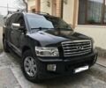 Чорний Інфініті QX56, об'ємом двигуна 0.56 л та пробігом 296 тис. км за 9000 $, фото 1 на Automoto.ua