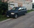 Черный Инфинити QX56, объемом двигателя 5.6 л и пробегом 140 тыс. км за 9500 $, фото 1 на Automoto.ua